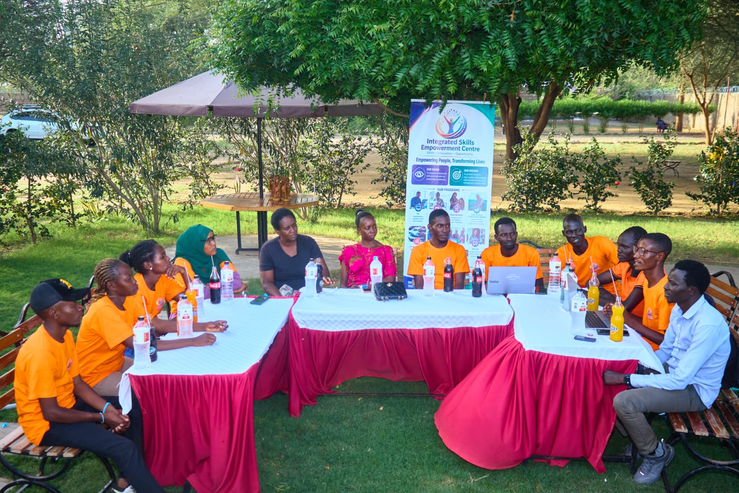 ISEC team meeting outdoors with youth